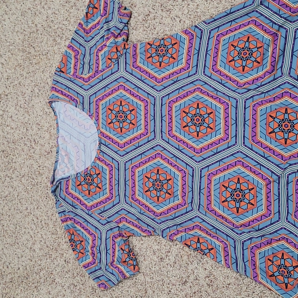 LuLaRoe patterned orange, blue, black, white flared tee